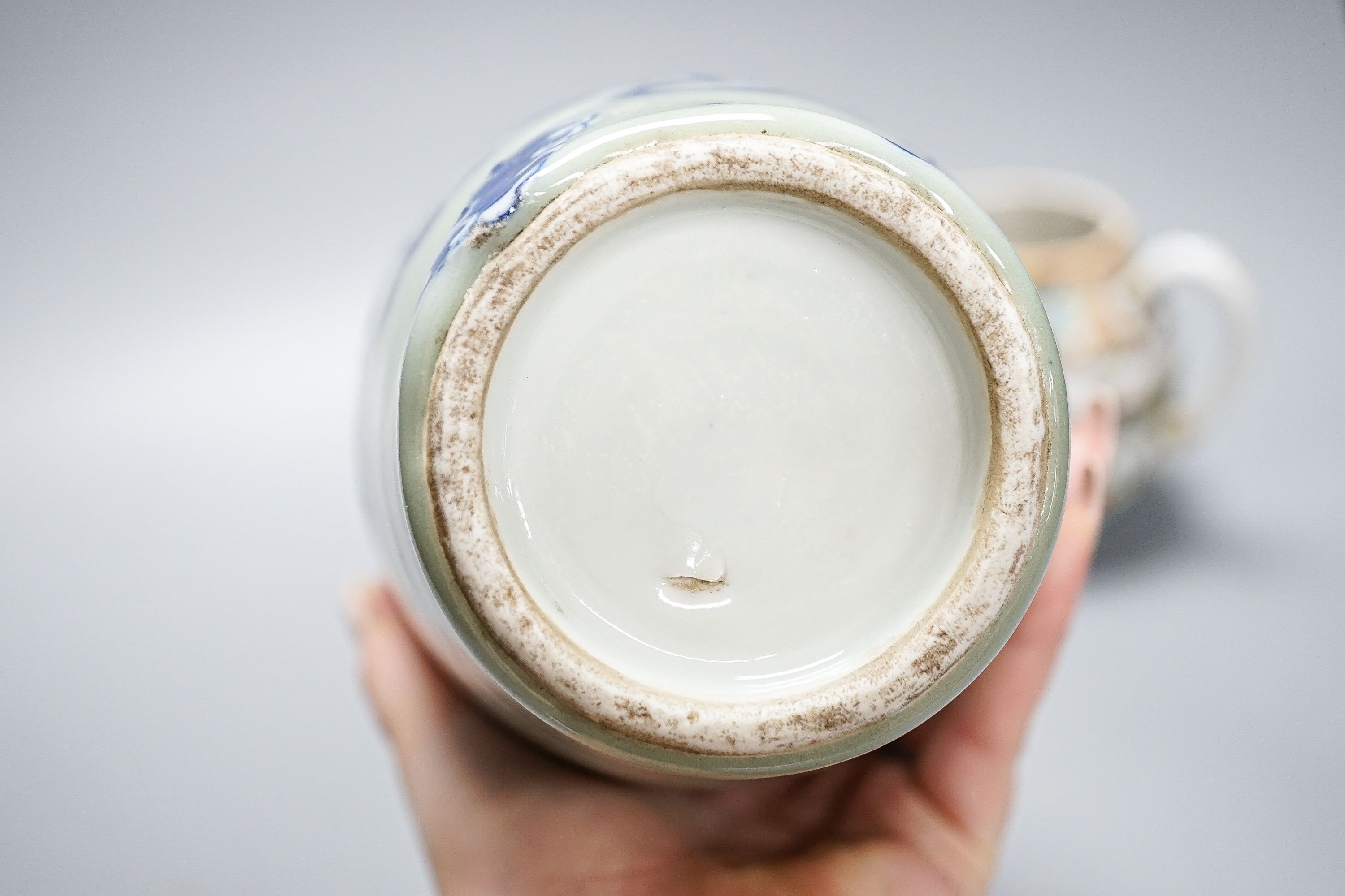 A Chinese celadon glazed vase, 24cm and a Chinese famille rose teapot and matching cream jug, a.f.